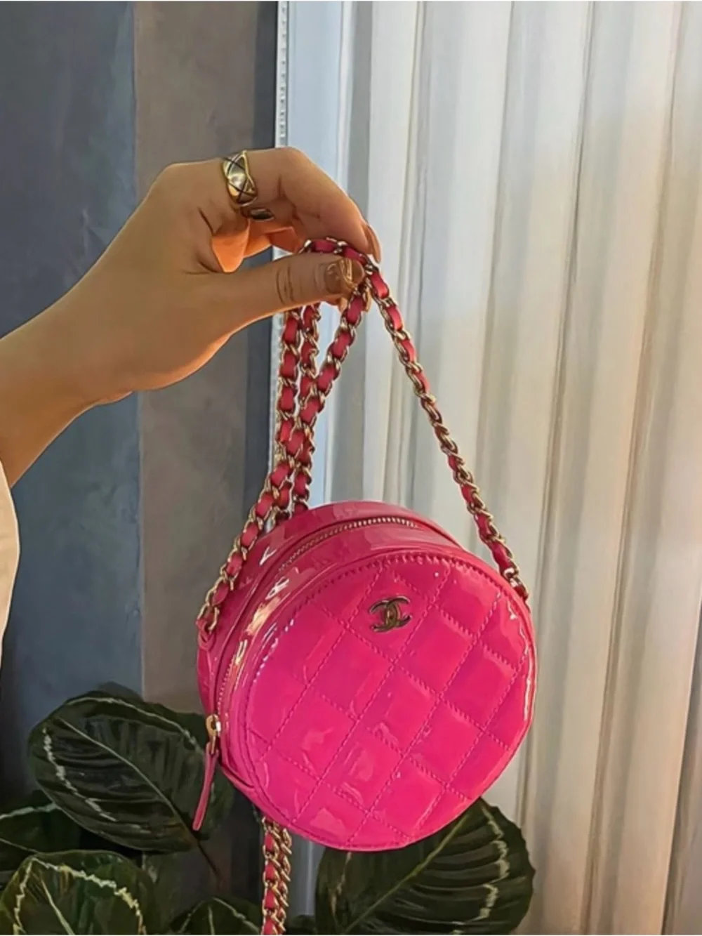 CHANEL Hot Pink Quilted Patent Leather Round Crossbody with Gold CC